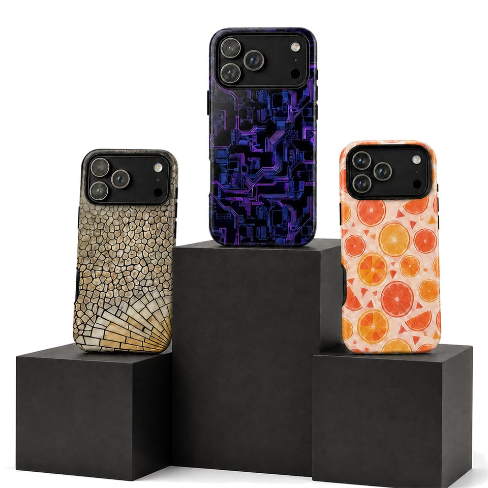Three GoCraftly custom phone cases displayed on charcoal pedestals